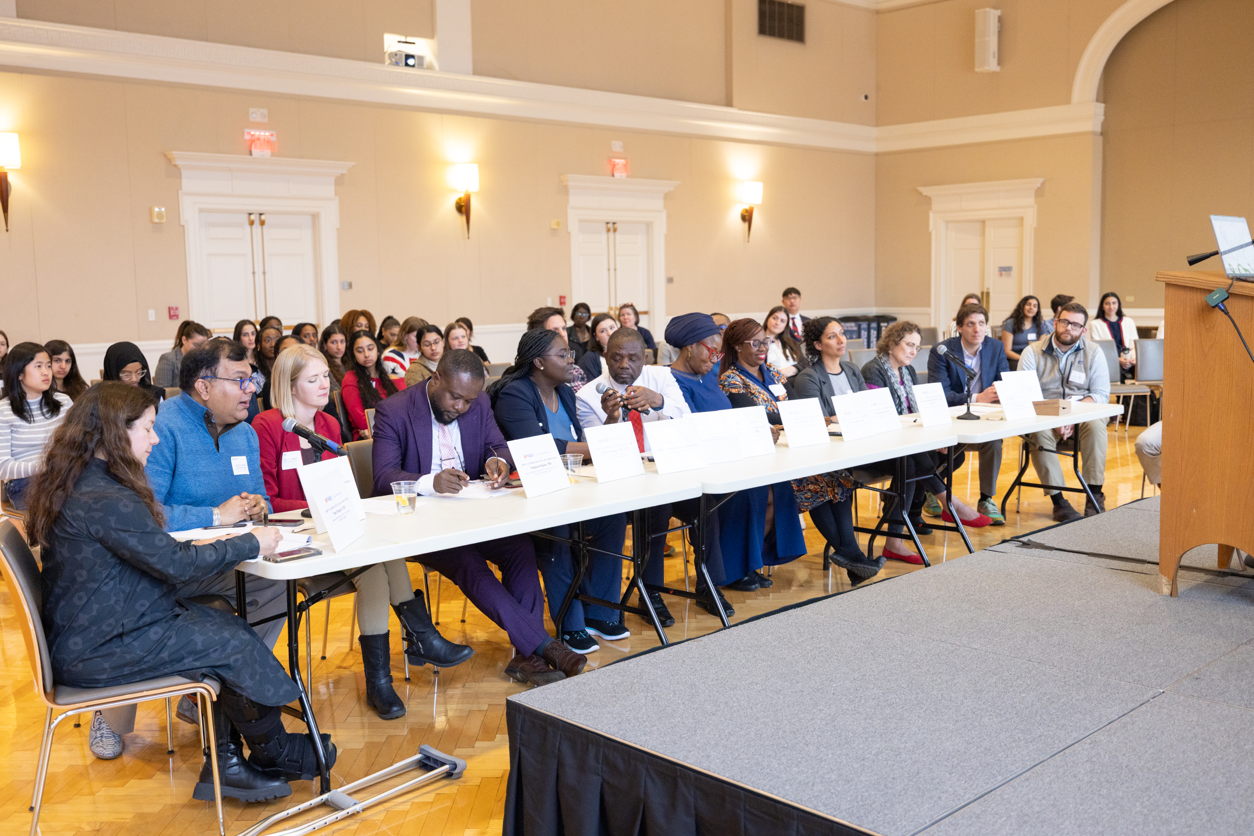 Panel of judges speak to one another