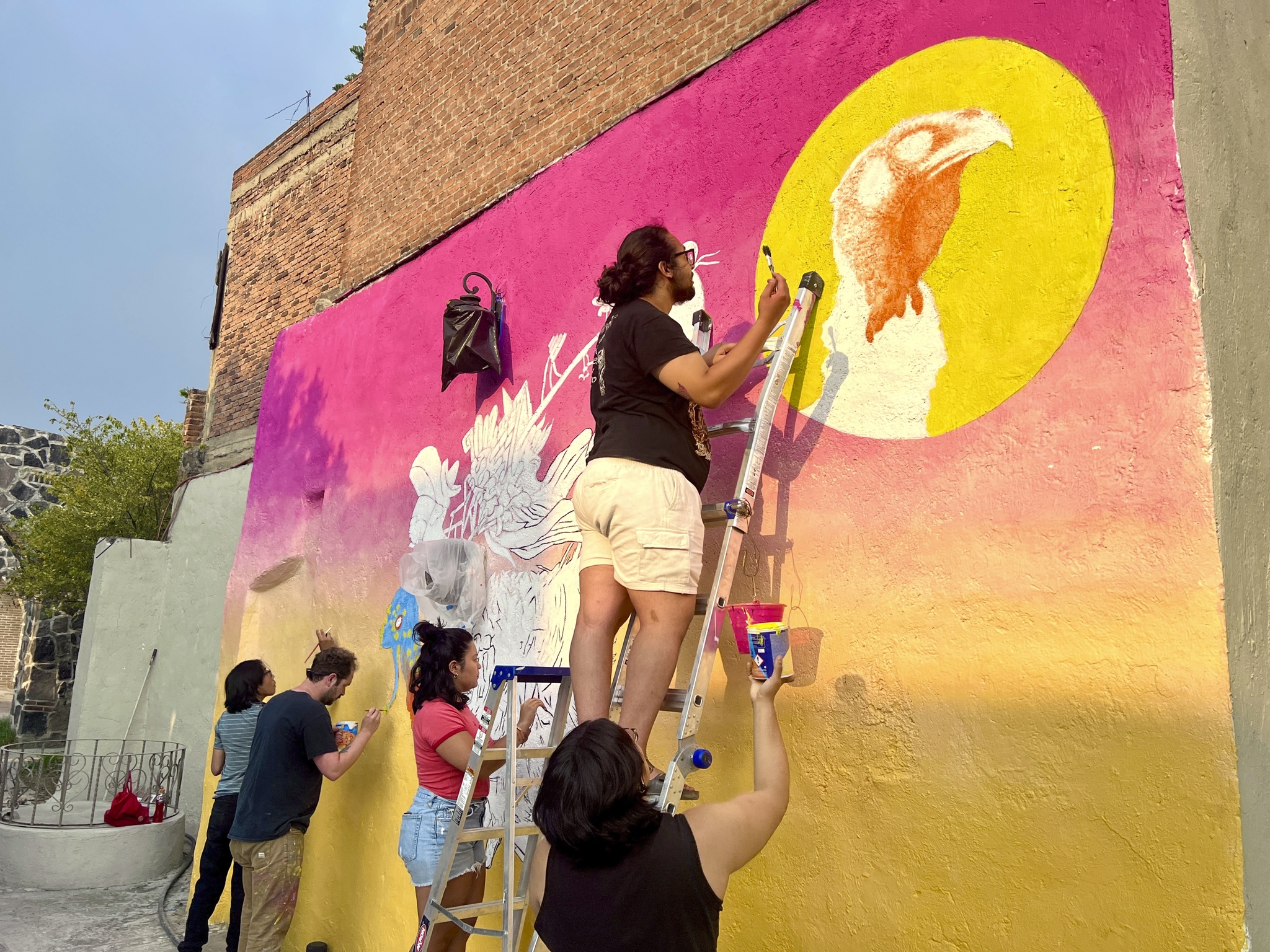 Students working on a mural in Mexico