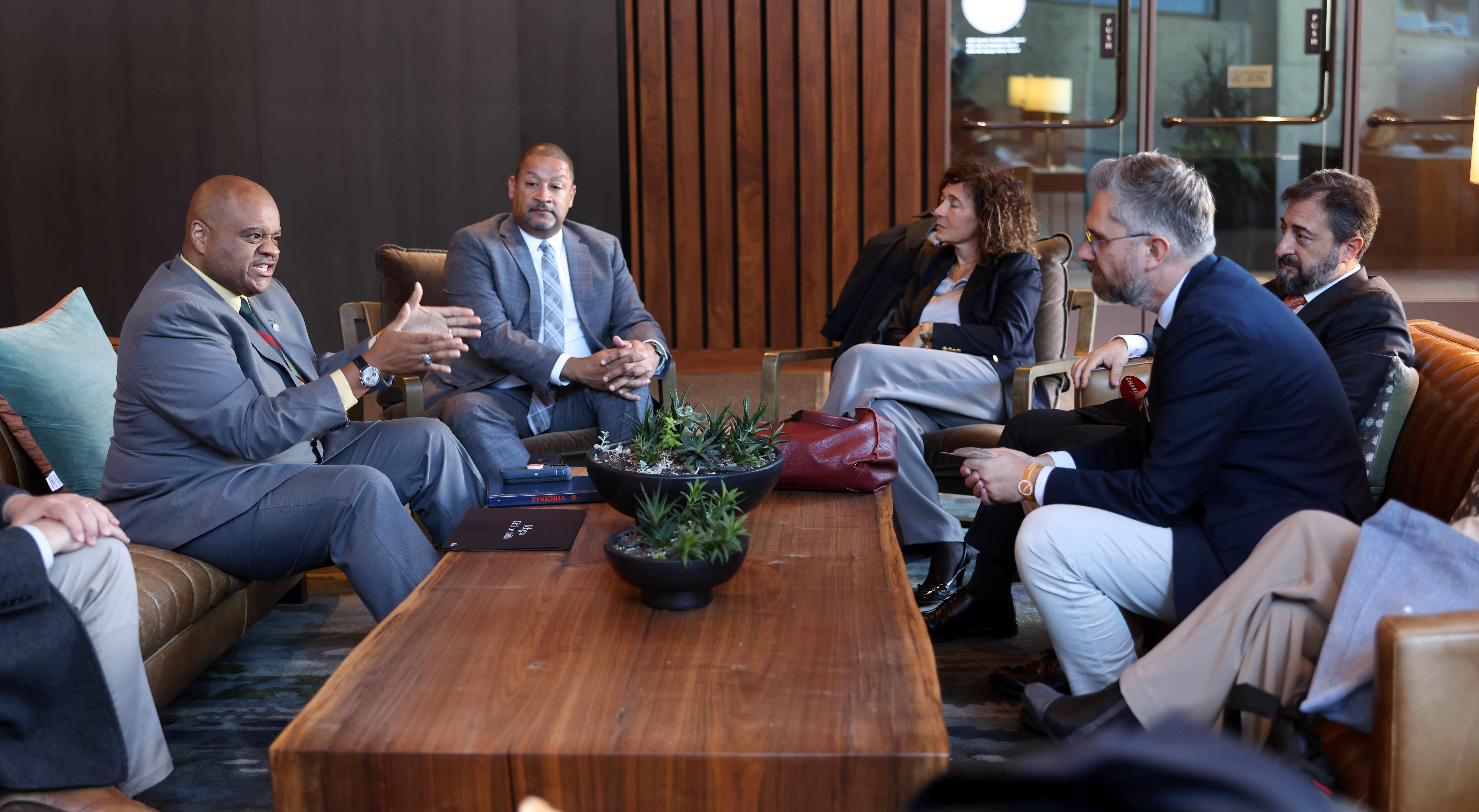 Mayor Juandiego Wade, seated with Charlottesville city manager Sam Sanders, addressed Mayor Lepore and the rest of the Bologna delegation.