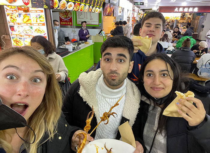 Trying out local street food in Shanghai
