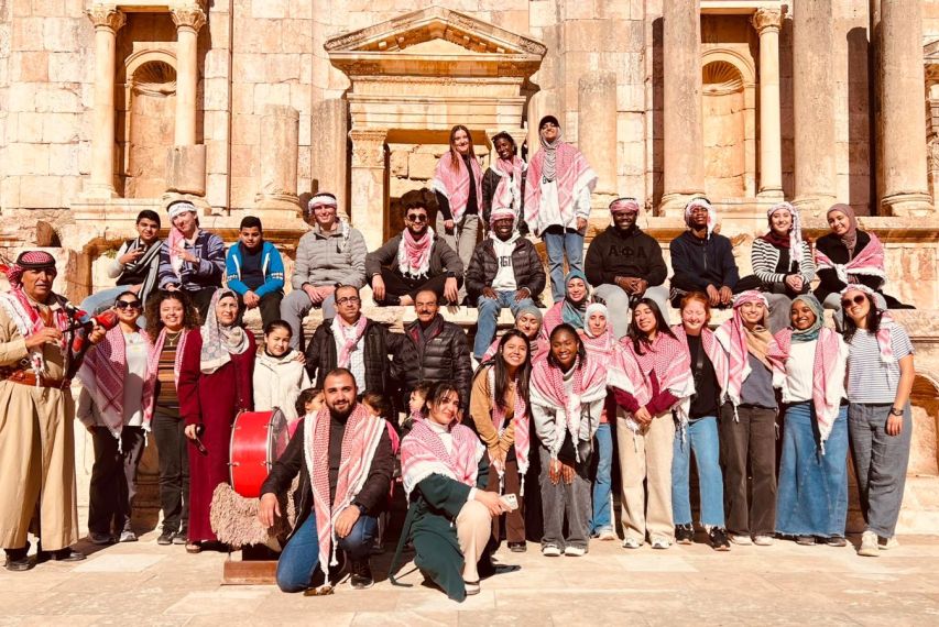 Students from UVA in Jordan program stand in front of Petra
