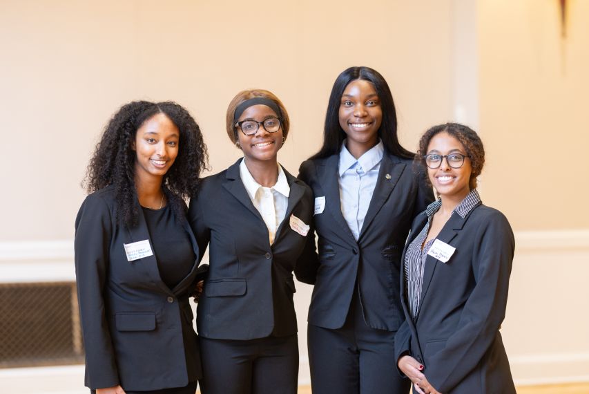 Four students from the winning team