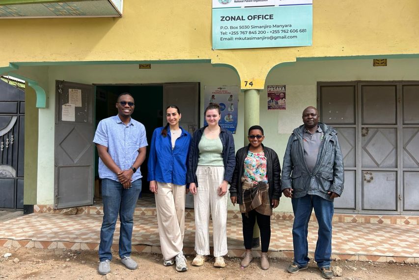 Group photo in front of building at KIDH