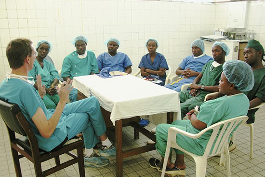 Marcel Durieux talking to doctors in Tanzania. Photo Courtesy of: Marcel Durieux