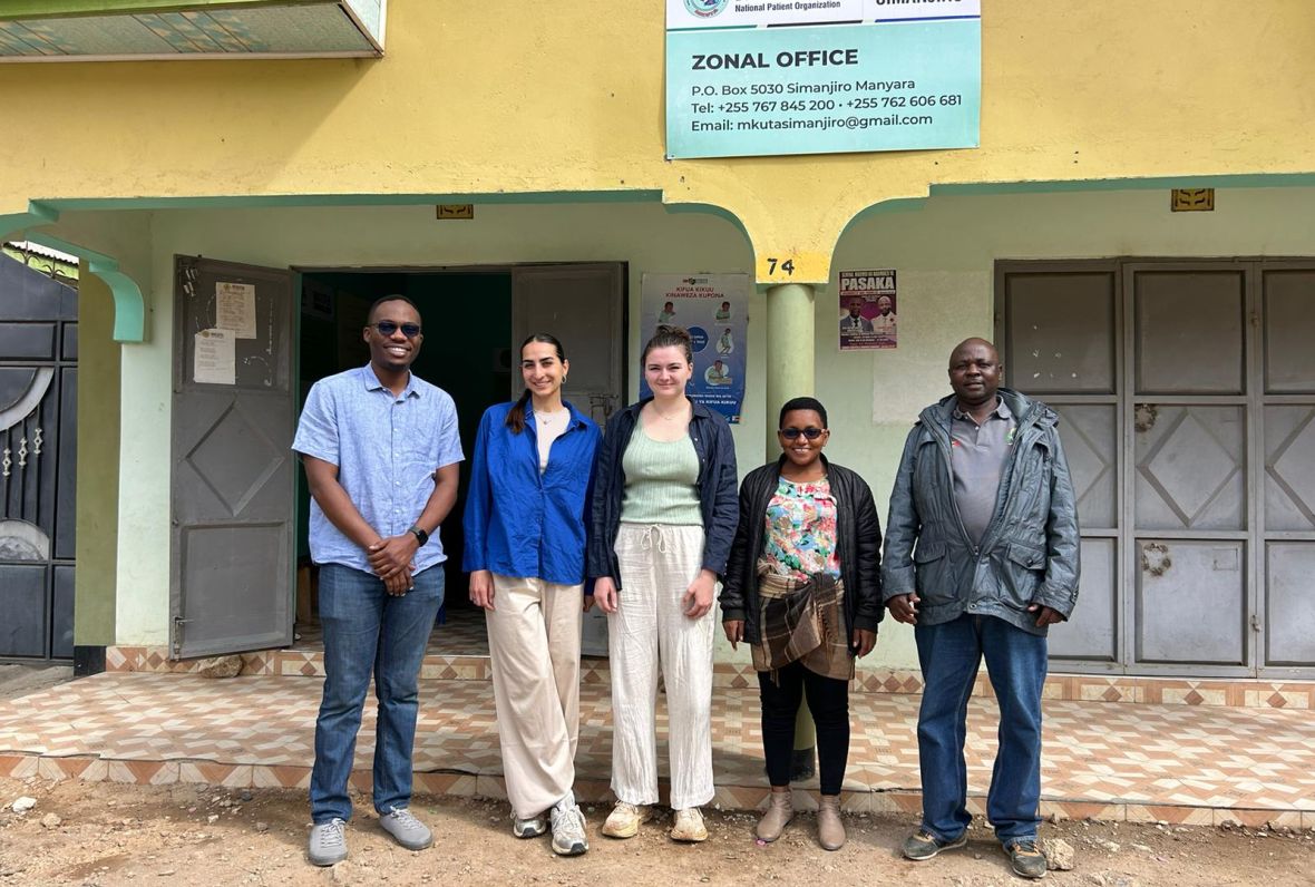 Group photo in front of building at KIDH