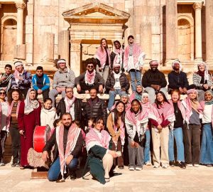 Students from UVA in Jordan program stand in front of Petra