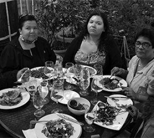 Sean Contreras, Dustina Gill, Micah Gill, Susan Thomas, and Rupa Valdez Seated at a Dining Table on Charlottesville's Downtown Mall