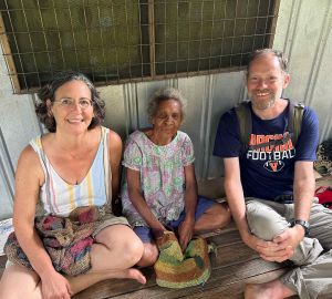 UVA linguist Lise Dobrin and UVA Wise ethnobotanist Ryan Huish flank a village elder, Lusi Taramap, who helped the researchers understand the relationships among banana varieties.