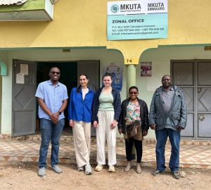 Group photo in front of building at KIDH