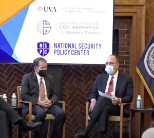 Panelists discuss on stage